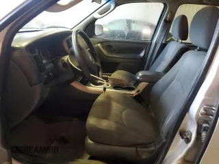 2006 Mazda Tribute i with VIN 4F2YZ02Z86KM02172, listed as a Copart auction lot 73214254 with 317,446 mi miles and Salvage Title. Bid and sale history available at carsss.com. Image 7.