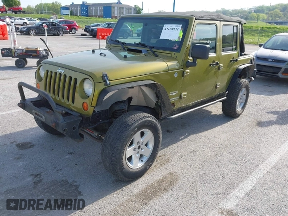 2007 Jeep Wrangler Unlimited Sahara with VIN 1J4GA59177L182593, listed as a IAAI auction lot 42104934 with 158,990 mi miles and . Bid and sale history available at DreamBid. Image 2.