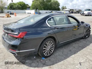 2022 BMW 7 Series 740i xDrive with VIN WBA7T4C05NCH98218, listed as a Copart auction lot 49058504 with 32,198 mi miles and . Bid and sale history available at DreamBid. Image 3.