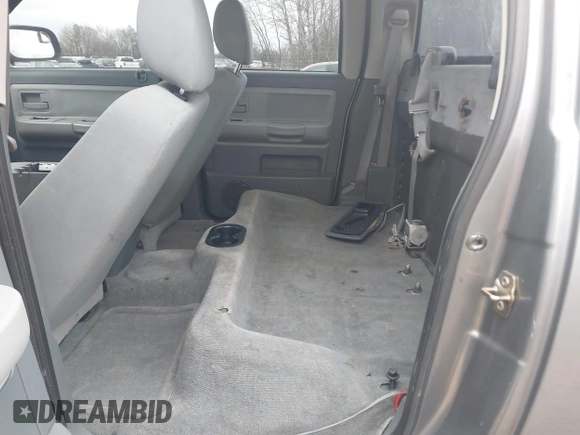2005 Dodge Dakota SLT with VIN 1D7HE48N05S293699, listed as a IAAI auction lot 41541498 with 166,159 mi miles and . Bid and sale history available at carsss.com. Image 8.