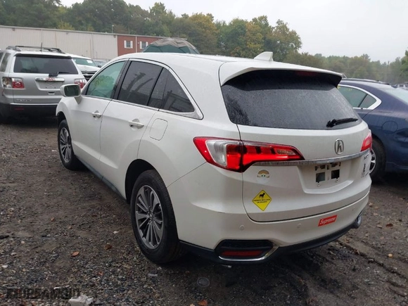 2018 Acura RDX w/Advance Pkg with VIN 5J8TB4H70JL009007, listed as a IAAI auction lot 40382722 with 104,933 mi miles. Bid and sale history available at carsss.com. Image 3.