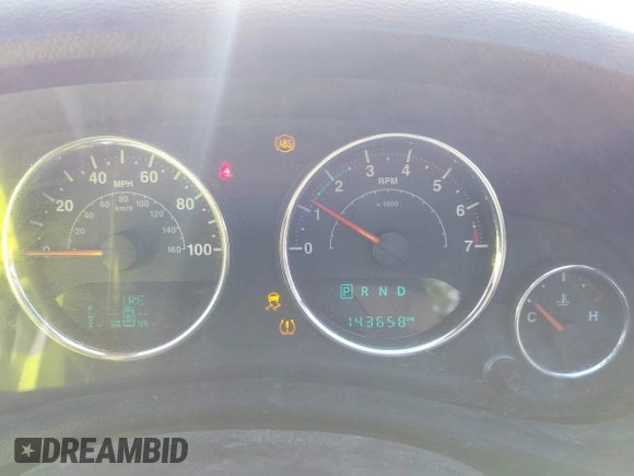 2015 Jeep Wrangler Sport z VIN 1C4AJWAG8FL550859, wystawiony jako IAAI lot #42154946 z przebiegiem 143 658 mil mil oraz . Historia ofert i sprzedaży dostępna na DreamBid. Obrazek 7.