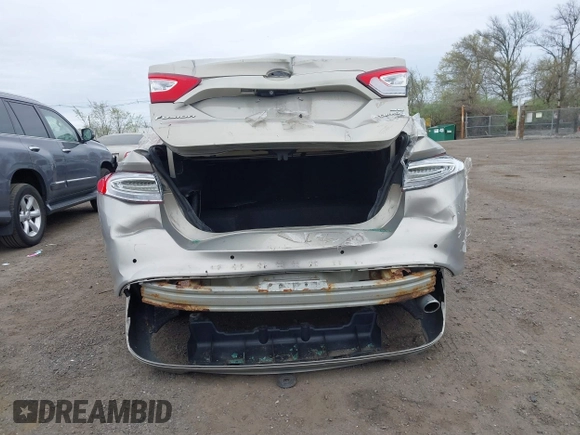2015 Ford Fusion SE Hybrid with VIN 3FA6P0LU6FR210606, listed as a IAAI auction lot 42070466 with 123,043 mi miles and . Bid and sale history available at DreamBid. Image 6.