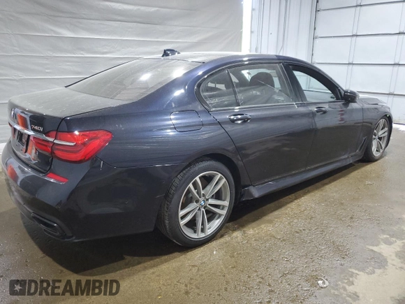 2019 BMW 7 Series 740i xDrive with VIN WBA7E4C58KGV70026, listed as a Copart auction lot 59465615 with Not provided miles and Salvage title. Bid and sale history available at DreamBid. Image 3.