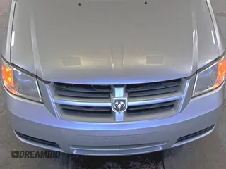 2010 Dodge Grand Caravan SE z VIN 2D4RN4DEXAR412152, wystawiony jako IAAI lot #42825395 z przebiegiem 93 398 mil mil oraz . Historia ofert i sprzedaży dostępna na DreamBid. Obrazek 3.