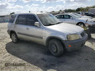 2000 Honda CR-V EX with VIN JHLRD1862YC059915, listed as a Copart auction lot 71445454 with 250,178 mi miles and Salvage Title. Bid and sale history available at carsss.com. Image 4.
