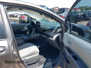 2021 Toyota Sienna LE with VIN 5TDKSKFC4MS004345, listed as a IAAI auction lot 42145140 with 103,544 mi miles and . Bid and sale history available at DreamBid. Image 5.