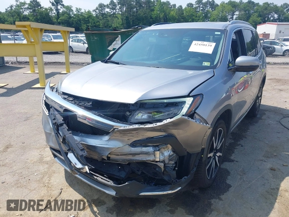 2019 Honda Pilot Elite with VIN 5FNYF6H08KB025449, listed as a IAAI auction lot 42450139 with 98,368 mi miles and . Bid and sale history available at DreamBid. Image 6.
