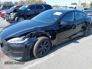 2022 Tesla Model S with VIN 5YJSA1E5XNF467435, listed as a IAAI auction lot 42538706 with 26,504 mi miles and . Bid and sale history available at DreamBid. Image 6.