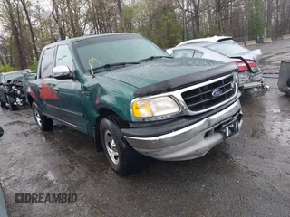 2001 Ford F-150 XLT z VIN 1FTRW07W71KD73445, wystawiony jako IAAI lot #41962341 z przebiegiem 101 818 mil mil oraz . Historia ofert i sprzedaży dostępna na DreamBid. Obrazek 1.