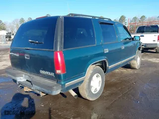 1996 Chevrolet Tahoe with VIN 1GNEK13R9TJ392739, listed as a IAAI auction lot 41559513 with 257,457 mi miles. Bid and sale history available at carsss.com. Image 4.