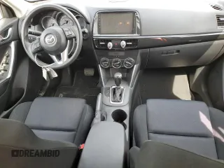 2015 Mazda CX-5 Sport z VIN JM3KE2BE8F0434116, wystawiony jako Copart lot #60712625 z przebiegiem 300 405 mil mil oraz Szkoda całkowita • Salvage title. Historia ofert i sprzedaży dostępna na DreamBid. Obrazek 8.