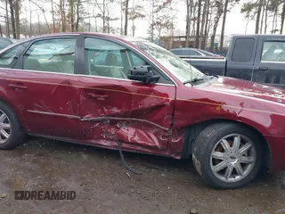 2005 Ford Five Hundred Limited with VIN 1FAFP25155G129701, listed as a IAAI auction lot 41402097 with 86,264 mi miles. Bid and sale history available at carsss.com. Image 6.