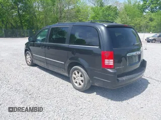 2010 Chrysler Town & Country Touring with VIN 2A4RR5D11AR102714, listed as a IAAI auction lot 42015585 with 176,216 mi miles. Bid and sale history available at carsss.com. Image 3.