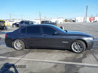 2015 BMW 7 Series 750Li with VIN WBAYE8C52FD780902, listed as a IAAI auction lot 40808265 with 102,774 mi miles. Bid and sale history available at carsss.com. Image 13.
