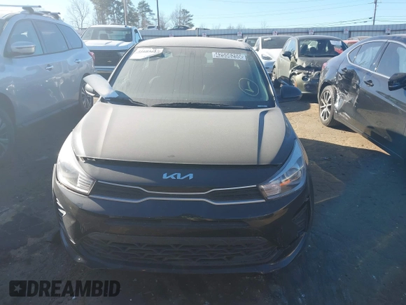 2022 Kia Rio S with VIN 3KPA25AD8NE443590, listed as a IAAI auction lot 41684325 with 73,231 mi miles and . Bid and sale history available at DreamBid. Image 12.