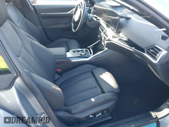 2024 BMW i4 eDrive40 with VIN WBY73AW05RFT33063, listed as a IAAI auction lot 41127587 with 1 mi miles. Bid and sale history available at carsss.com. Image 5.