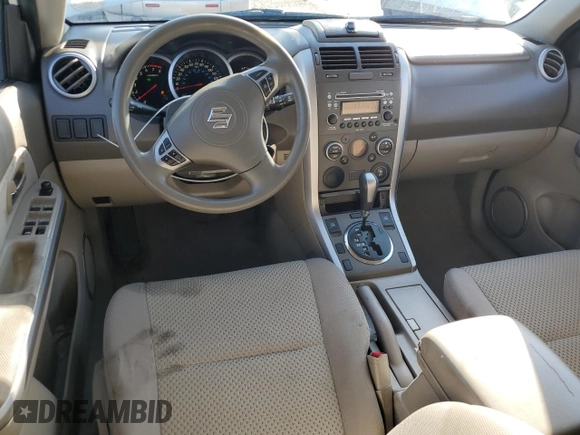 2012 Suzuki Grand Vitara Premium z VIN JS3TD0D64C4100245, wystawiony jako Copart lot #71365134 z przebiegiem 100 501 mil mil oraz Szkoda całkowita • Salvage title. Historia ofert i sprzedaży dostępna na DreamBid. Obrazek 8.