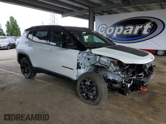 2023 Jeep Compass Trailhawk with VIN 3C4NJDDN1PT503243, listed as a Copart auction lot 60724475 with 13,063 mi miles and Salvage title. Bid and sale history available at DreamBid. Image 4.
