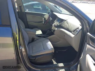 2017 Hyundai Tucson SE Plus with VIN KM8J33A45HU452928, listed as a IAAI auction lot 41601229 with 114,949 mi miles. Bid and sale history available at carsss.com. Image 5.