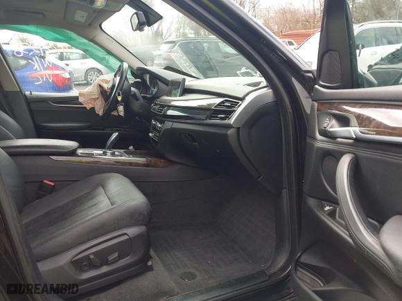 2016 BMW X5 xDrive35i with VIN 5UXKR0C5XG0P30741, listed as a IAAI auction lot 41724236 with 62,964 mi miles. Bid and sale history available at carsss.com. Image 5.