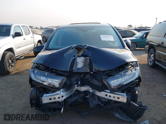 2025 Honda Odyssey Touring with VIN 5FNRL6H81SB011122, listed as a IAAI auction lot 41402170 with 2,968 mi miles and . Bid and sale history available at DreamBid. Image 6.