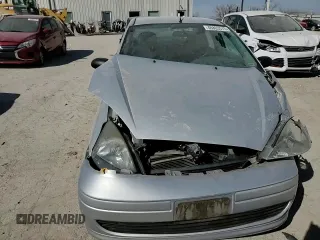 2003 Ford Focus LX с VIN 1FAFP33P63W187283, выставлен на аукционе Copart как лот 48803575 с пробегом Не указан миль и Списание • Salvage title. История ставок и продаж доступна на DreamBid. Изображение 10.