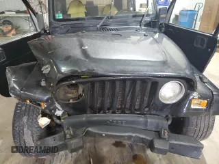 2001 Jeep Wrangler Sport with VIN 1J4FA49S01P352257, listed as a Copart auction lot 47084425 with 114,414 mi miles and Salvage Title. Bid and sale history available at carsss.com. Image 12.