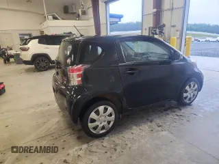 2012 Scion iQ z VIN JTNJJXB04CJ012587, wystawiony jako Copart lot #58191845 z przebiegiem 104 601 mil mil oraz Szkoda całkowita • Salvage title. Historia ofert i sprzedaży dostępna na DreamBid. Obrazek 3.