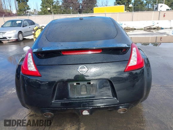 2012 Nissan 370Z Touring with VIN JN1AZ4EH4CM561303, listed as a IAAI auction lot 41788638 with 111,958 mi miles. Bid and sale history available at carsss.com. Image 16.