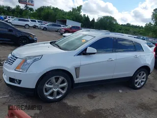 2015 Cadillac SRX Premium Collection with VIN 3GYFNDE37FS627697, listed as a IAAI auction lot 42354811 with 64,135 mi miles and . Bid and sale history available at DreamBid. Image 15.