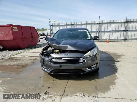 2015 Ford Focus Titanium с VIN 1FADP3J2XFL200668, выставлен на аукционе Copart как лот 54010865 с пробегом 138 459 миль миль и Списание • Salvage title. История ставок и продаж доступна на DreamBid. Изображение 13.