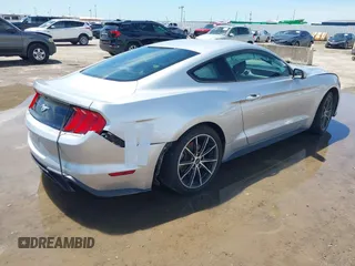 2018 Ford Mustang EcoBoost with VIN 1FA6P8THXJ5128830, listed as a IAAI auction lot 42192673 with 58,817 mi miles and . Bid and sale history available at DreamBid. Image 4.