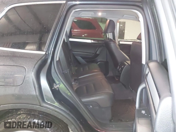 2013 Volkswagen Touareg Lux with VIN WVGEF9BP6DD007032, listed as a IAAI auction lot 41684721 with 147,249 mi miles and . Bid and sale history available at DreamBid. Image 8.