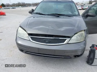 2005 Ford Focus S with VIN 1FAFP34N05W309572, listed as a IAAI auction lot 41861194 with 216,943 mi miles. Bid and sale history available at carsss.com. Image 6.