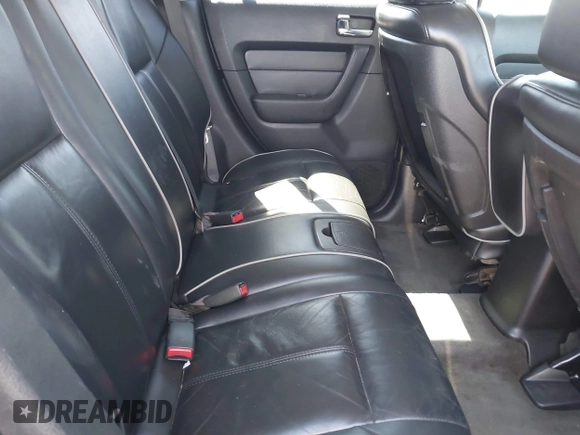 2007 Hummer H3 SUV with VIN 5GTDN13E578153252, listed as a IAAI auction lot 42003767 with 130,810 mi miles. Bid and sale history available at carsss.com. Image 8.