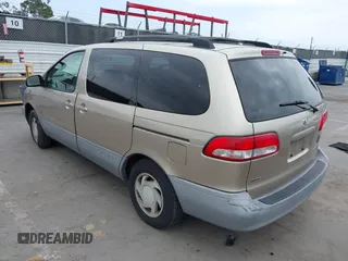 2002 Toyota Sienna LE with VIN 4T3ZF13C92U469670, listed as a IAAI auction lot 42141259 with 222,299 mi miles and . Bid and sale history available at DreamBid. Image 3.