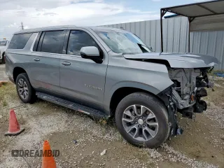 2023 Chevrolet Suburban LT with VIN 1GNSCCKD5PR308814, listed as a Copart auction lot 61955315 with 33,659 mi miles and Salvage title. Bid and sale history available at DreamBid. Image 4.