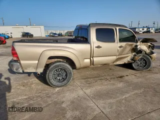 2005 Toyota Tacoma PreRunner z VIN 3TMKU72N85M003408, wystawiony jako Copart lot #57670935 z przebiegiem 247 189 mil mil oraz Szkoda całkowita • Salvage title. Historia ofert i sprzedaży dostępna na DreamBid. Obrazek 3.