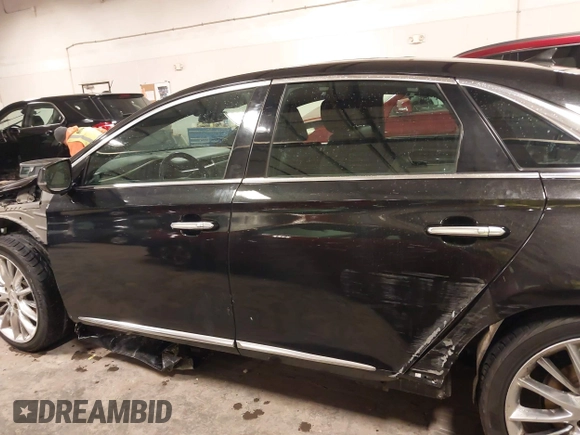 2014 Cadillac XTS Platinum with VIN 2G61W5S88E9186969, listed as a IAAI auction lot 41422872 with 184,998 mi miles and . Bid and sale history available at DreamBid. Image 14.