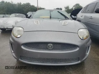 2010 Jaguar XK with VIN SAJWA4DC7AMB34148, listed as a Copart auction lot 74837624 with 0 mi miles and Salvage Title. Bid and sale history available at carsss.com. Image 5.