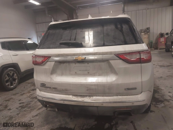 2018 Chevrolet Traverse Premier with VIN 1GNEVJKW2JJ103924, listed as a IAAI auction lot 41576128 with 128,694 mi miles. Bid and sale history available at carsss.com. Image 16.