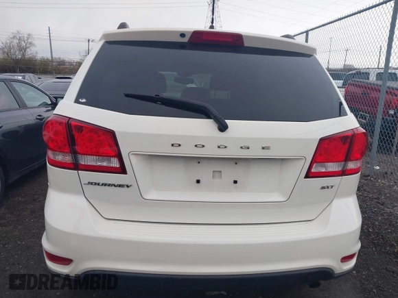 2014 Dodge Journey SXT with VIN 3C4PDCBB8ET153190, listed as a IAAI auction lot 41854655 with 153,048 mi miles and . Bid and sale history available at DreamBid. Image 16.