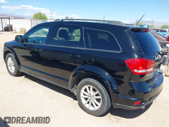 2015 Dodge Journey SXT with VIN 3C4PDCBG3FT678686, listed as a IAAI auction lot 42101541 with 185,514 mi miles and . Bid and sale history available at DreamBid. Image 3.