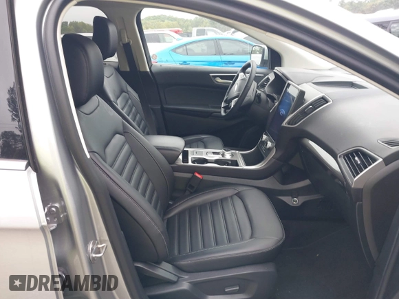 2024 Ford Edge SEL z VIN 2FMPK4J94RBA67639, wystawiony jako IAAI lot #40316176 z przebiegiem 5319 mil mil oraz . Historia ofert i sprzedaży dostępna na DreamBid. Obrazek 5.