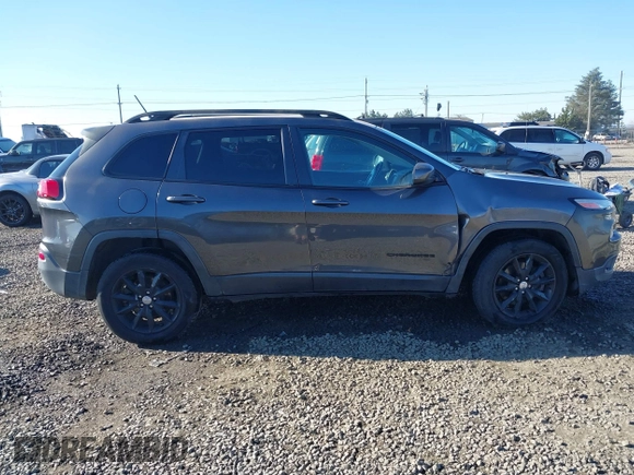 2014 Jeep Cherokee Latitude with VIN 1C4PJMCB5EW294631, listed as a IAAI auction lot 41453628 with 127,847 mi miles and . Bid and sale history available at DreamBid. Image 14.