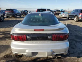 2000 Pontiac Firebird Firebird z VIN 2G2FS22K3Y2159513, wystawiony jako Copart lot #85164814 z przebiegiem 187 188 mil mil oraz Szkoda całkowita • Salvage title. Historia ofert i sprzedaży dostępna na DreamBid. Obrazek 6.