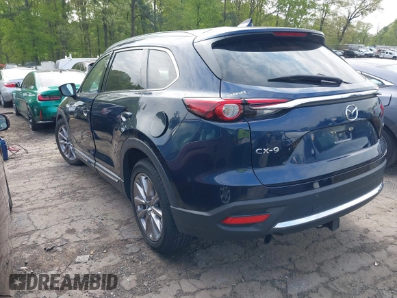 2021 Mazda CX-9 Carbon Edition with VIN JM3TCADY1M0516505, listed as a IAAI auction lot 42016644 with 50,900 mi miles and . Bid and sale history available at carsss.com. Image 3.