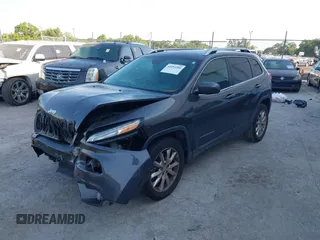 2014 Jeep Cherokee Limited z VIN 1C4PJLDS4EW238513, wystawiony jako IAAI lot #42093200 z przebiegiem 77 007 mil mil oraz . Historia ofert i sprzedaży dostępna na DreamBid. Obrazek 2.
