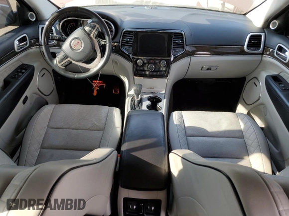2019 Jeep Grand Cherokee Summit with VIN 1C4RJFJT3KC595525, listed as a Copart auction lot 77857234 with 67,104 mi miles and Salvage Title. Bid and sale history available at carsss.com. Image 8.